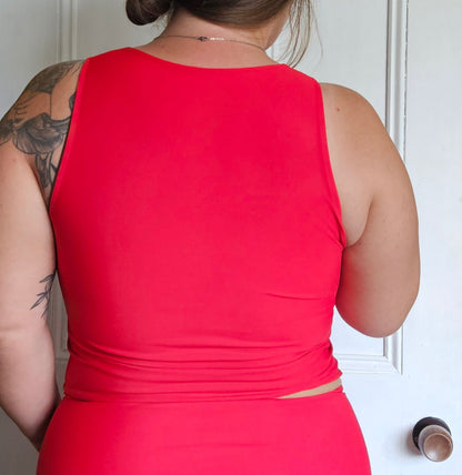 woman wearing lola top in siren colour from the back