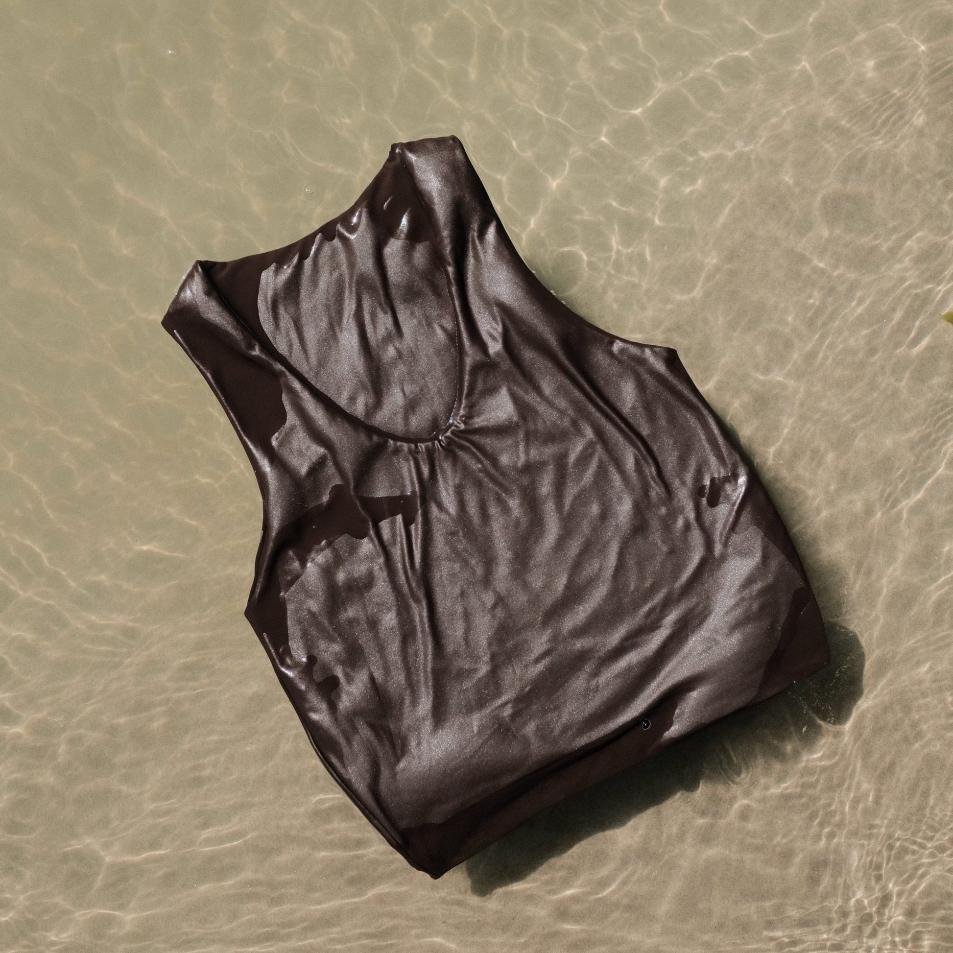 Lola swim top in espresso colour in water