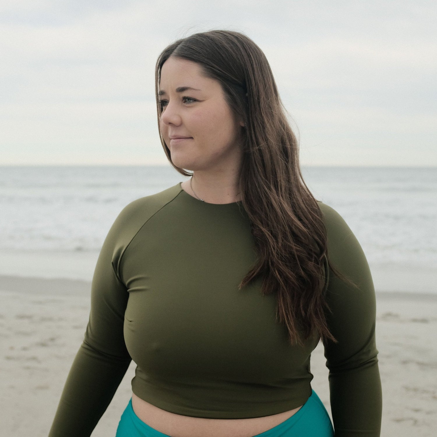 woman wearing long sleeve ray rash guard